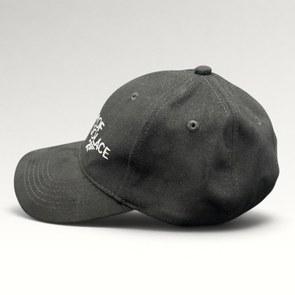Raree Finds black Quantum of Solace 007 strapback hat with white embroidered film title and gun logo on curved bill