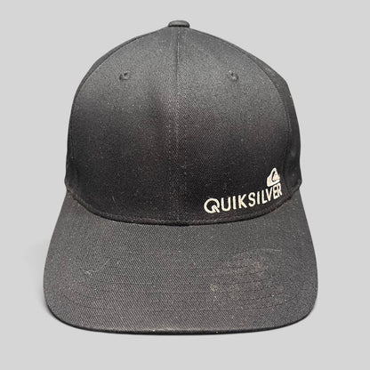Raree Finds black Quiksilver Flexfit cap with white embroidered mountain and wave logo on a structured crown