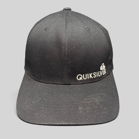 Raree Finds black Quiksilver Flexfit cap with white embroidered mountain and wave logo on a structured crown