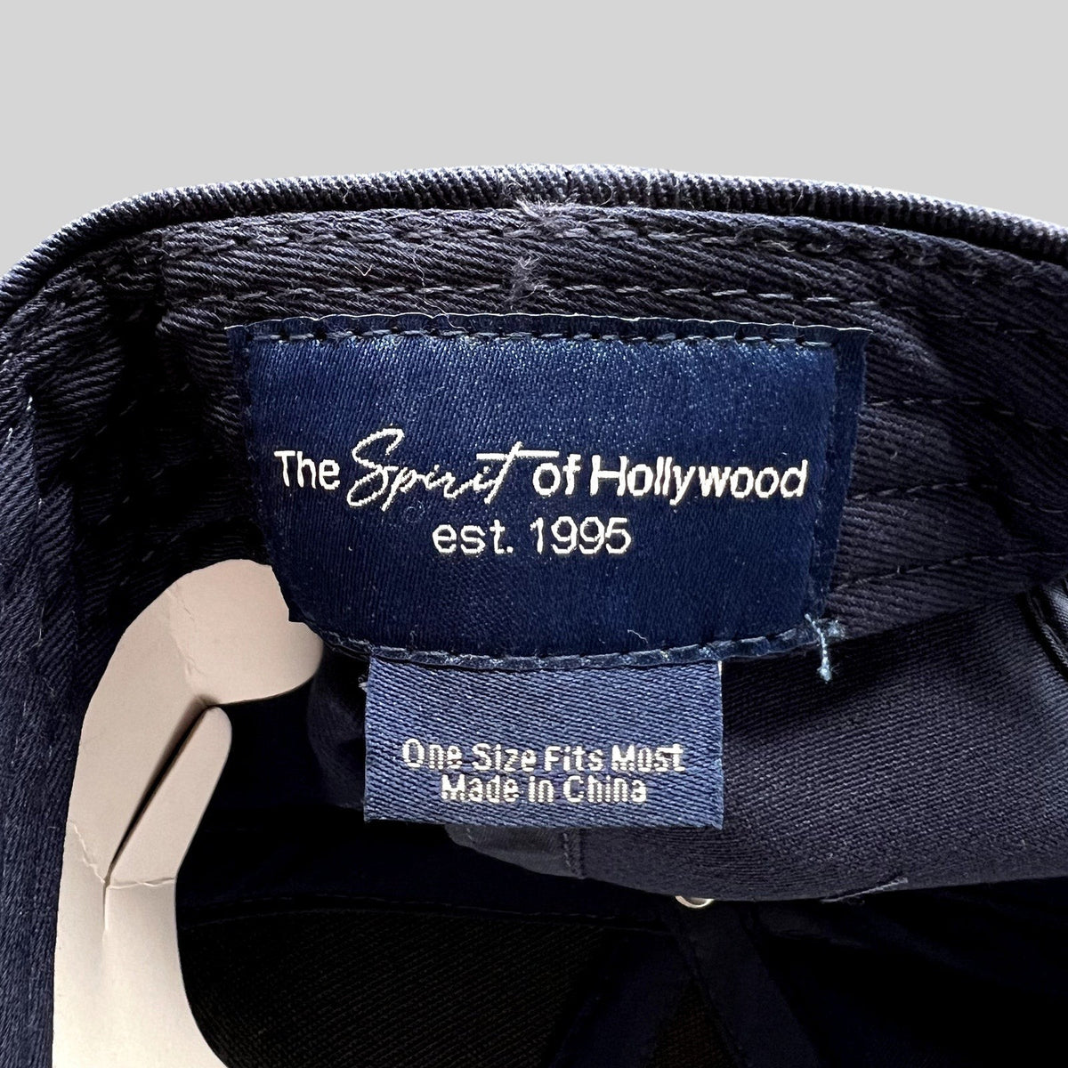 Raree Finds Quixote Studios snapback interior label reading The Spirit of Hollywood est 1995 in navy blue