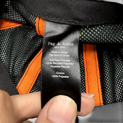Raree Finds Rag & Bone New York cap interior tag showing 100% recycled polyester material and mesh lining details