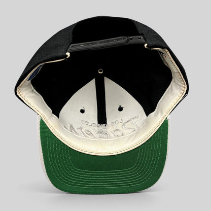 Raree Finds vintage Sports Specialties Los Angeles Raiders snapback hat showing the green undervisor and interior