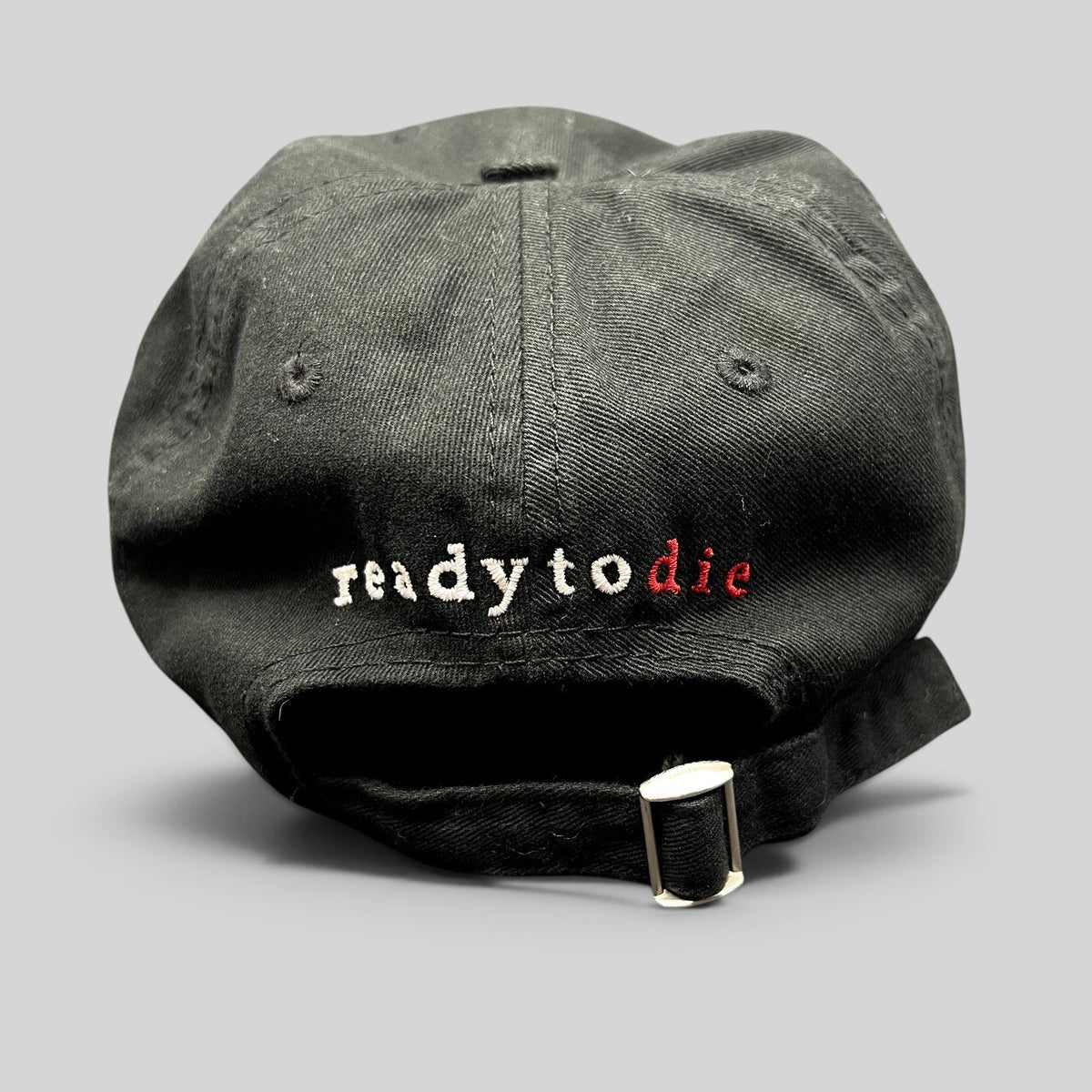 Raree Finds black strapback hat featuring Ready To Die embroidered in white and red on the back with metal closure.