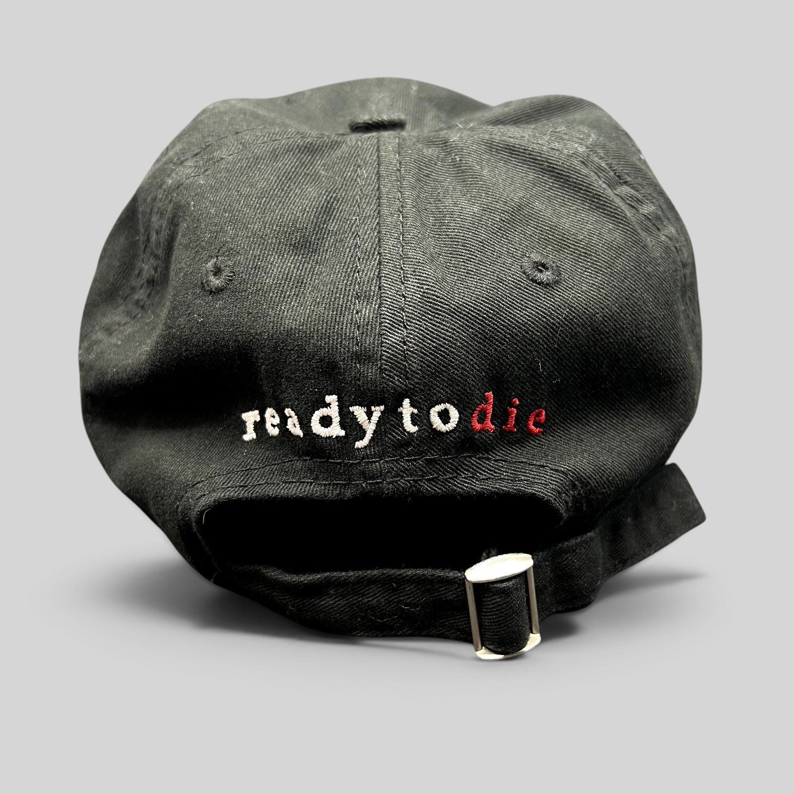 Raree Finds black strapback hat featuring Ready To Die embroidered in white and red on the back with metal closure.