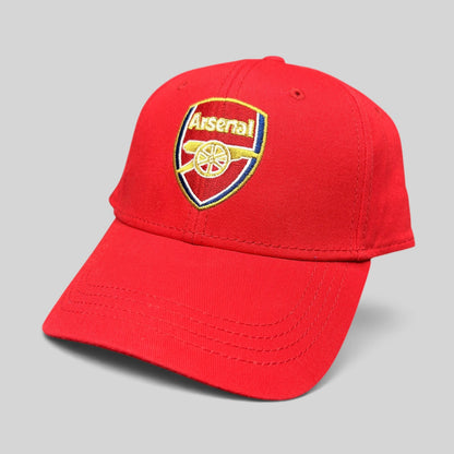 Raree Finds red Arsenal FC strapback hat with embroidered cannon crest logo and curved brim on a black background