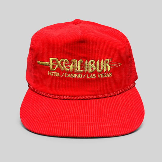 Raree Finds vintage 90s red corduroy snapback hat with gold Excalibur Hotel Casino Las Vegas embroidery and rope brim