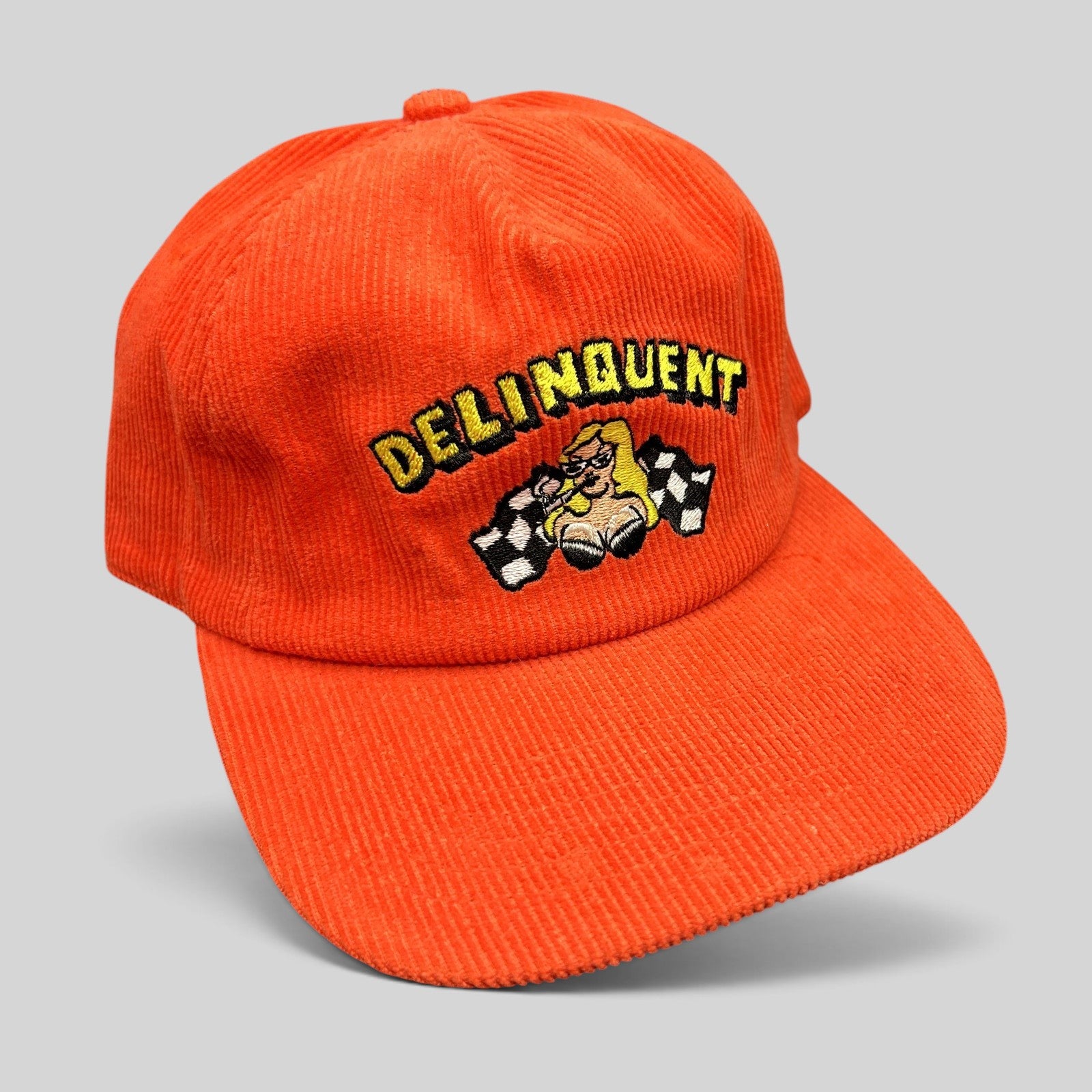 Raree Finds red corduroy snapback hat by Delinquent Bros featuring embroidered pinup girl and checkered racing flags
