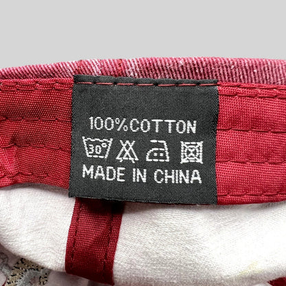 Raree Finds vintage red cotton hat interior care label showing 100% cotton material and laundry instructions