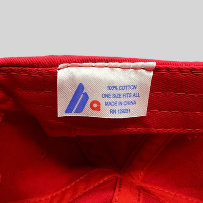 Raree Finds red cotton hat interior label showing 100 percent cotton material and one size fits all details