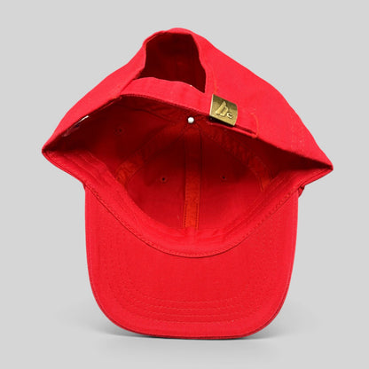 Raree Finds red cotton strapback hat featuring an adjustable brass buckle closure with Clay Lacy Aviation branding.