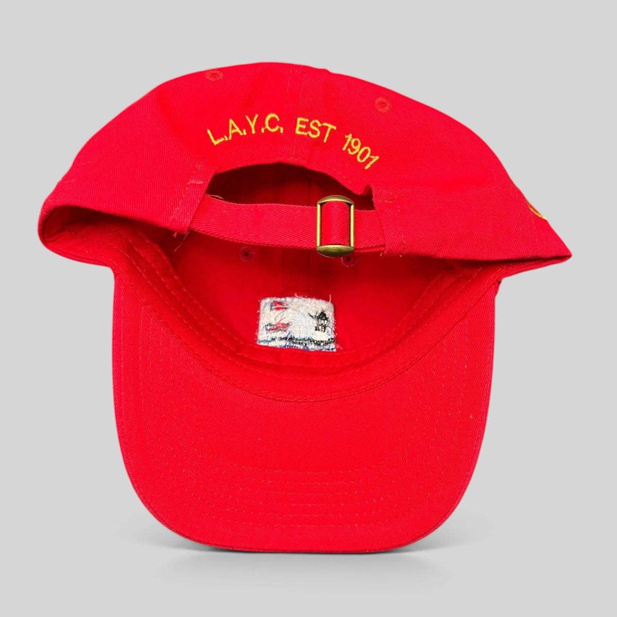 Raree Finds red cotton strapback hat with L.A.Y.C. EST 1907 embroidery and brass buckle closure