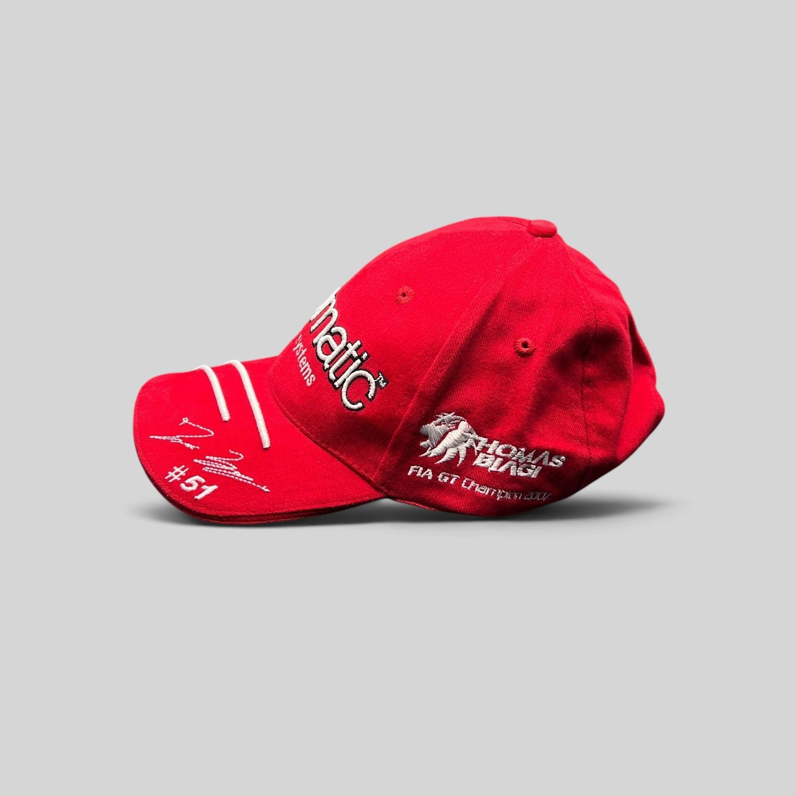 Raree Finds red Enomatic Ferrari racing hat with Thomas Biagi #51 embroidery and white racing stripe on curved brim