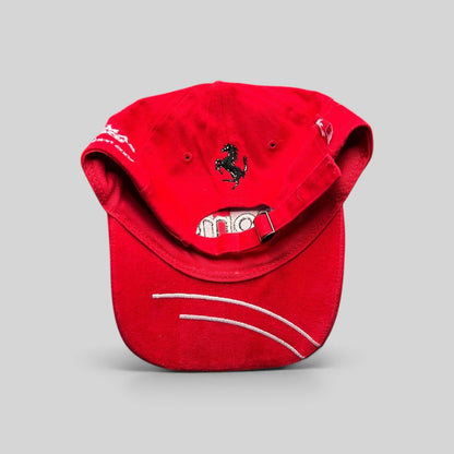 Raree Finds red Enomatic Ferrari racing hat with black prancing horse embroidery on the back and white brim stitching