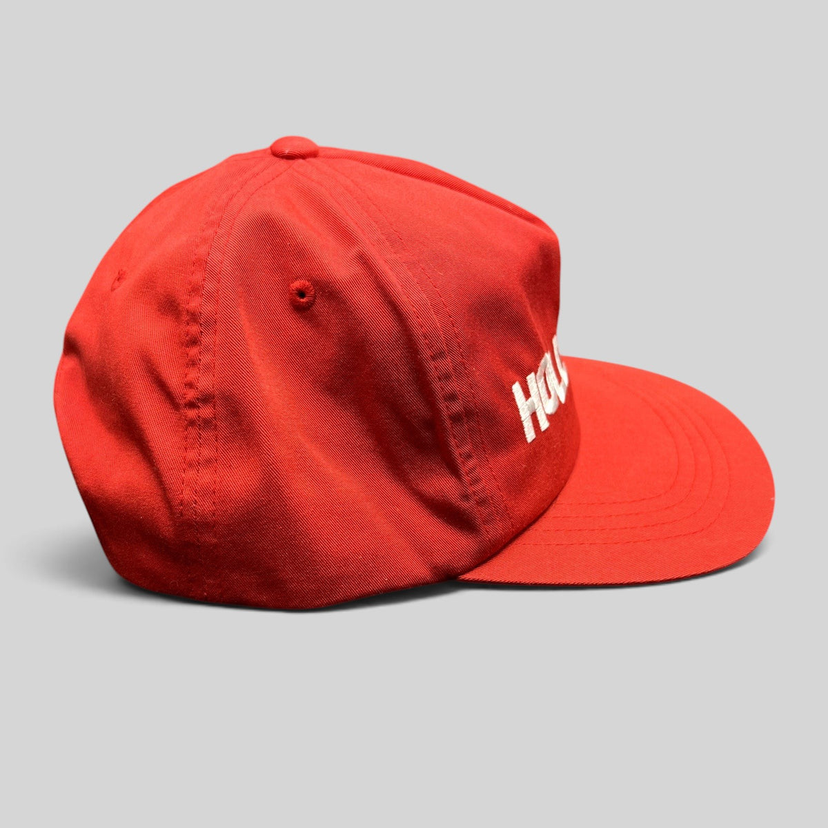 Raree Finds retro red Yupoong snapback hat with white HOLLYWOOD embroidery and a flat brim