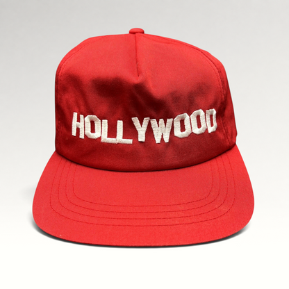 Raree Finds retro red snapback hat with white HOLLYWOOD embroidery on a structured crown and flat brim