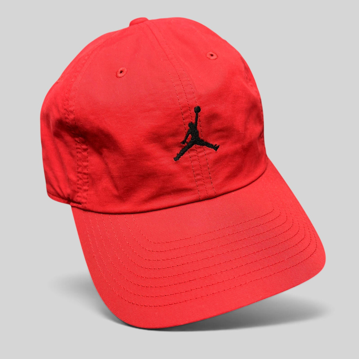 Raree Finds red Nike Air Jordan club cap with a black embroidered Jumpman logo and an adjustable strapback closure.
