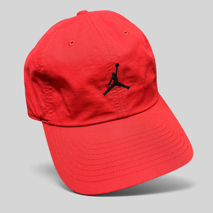 Raree Finds red Nike Air Jordan club cap with a black embroidered Jumpman logo and an adjustable strapback closure.