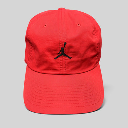 Raree Finds red Nike Air Jordan strapback club cap with a black embroidered Jumpman logo and curved brim