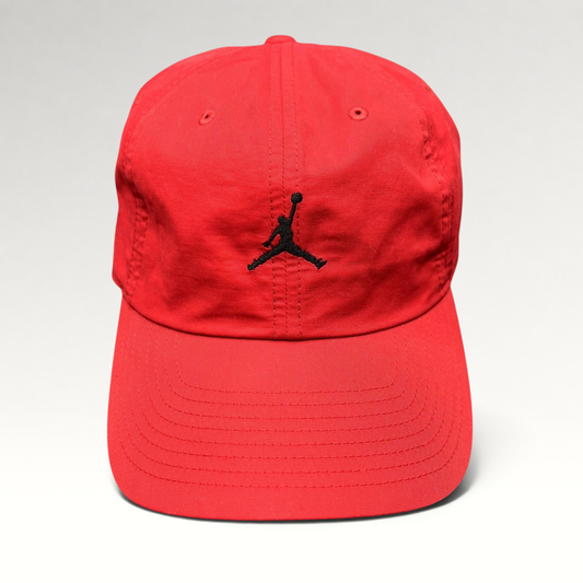 Raree Finds red Nike Air Jordan strapback club cap with a black embroidered Jumpman logo and curved brim