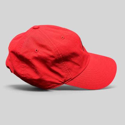 Raree Finds Nike Air Jordan red strapback club cap with a curved brim and unstructured low-profile fit.