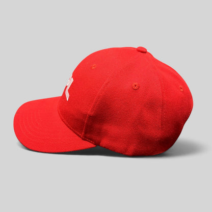 Raree Finds red JPL NASA snapback hat with white embroidered logo, side profile view on a grey background.
