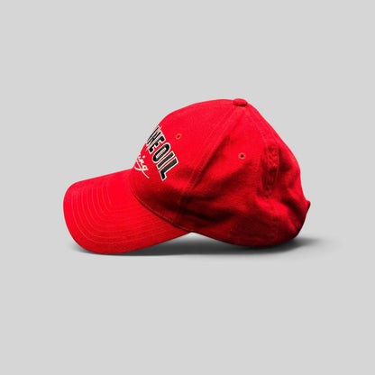 Raree Finds vintage red Red Line Oil racing snapback hat with black and white embroidery and a curved brim