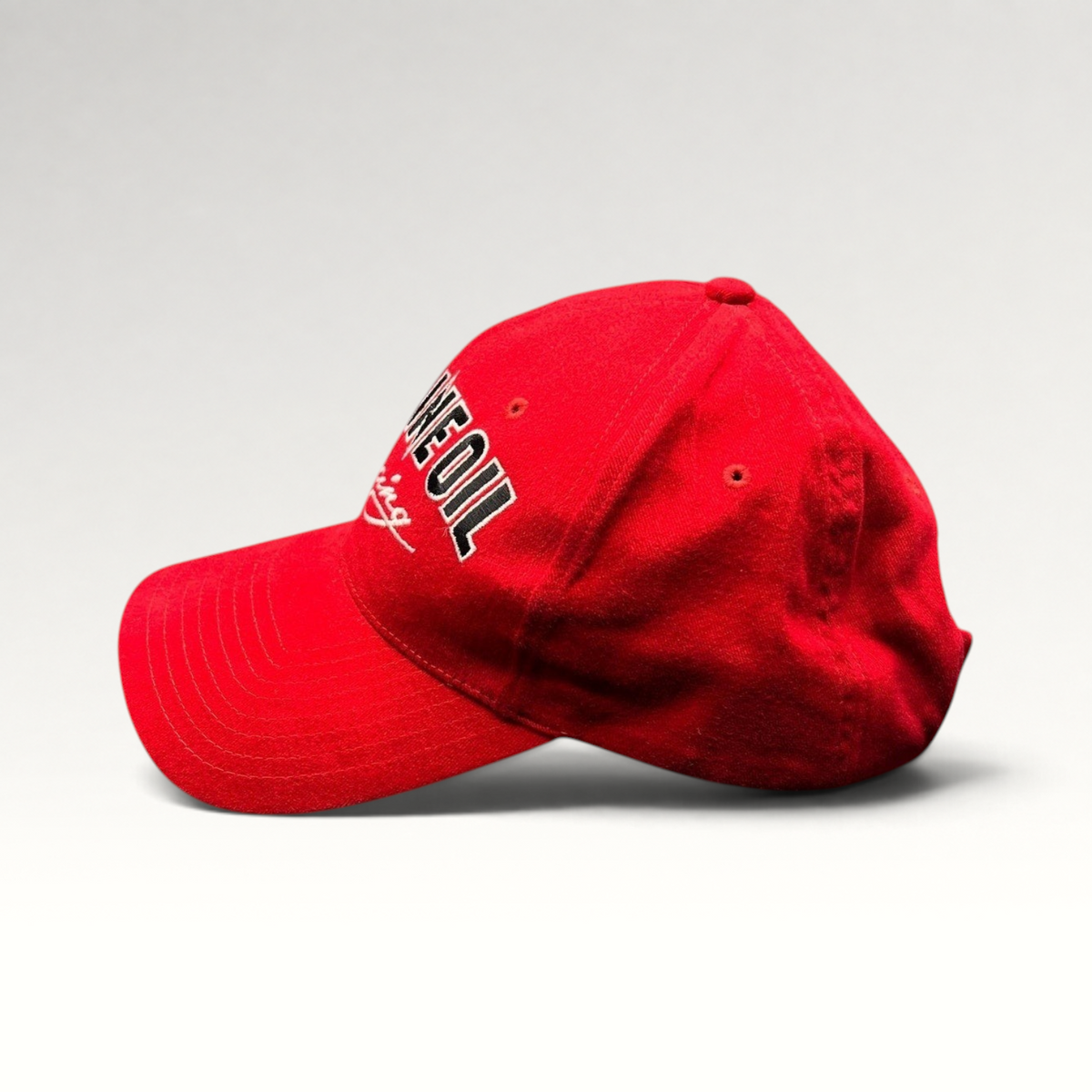 Raree Finds vintage red Red Line Oil racing snapback hat with black and white embroidery and a curved brim