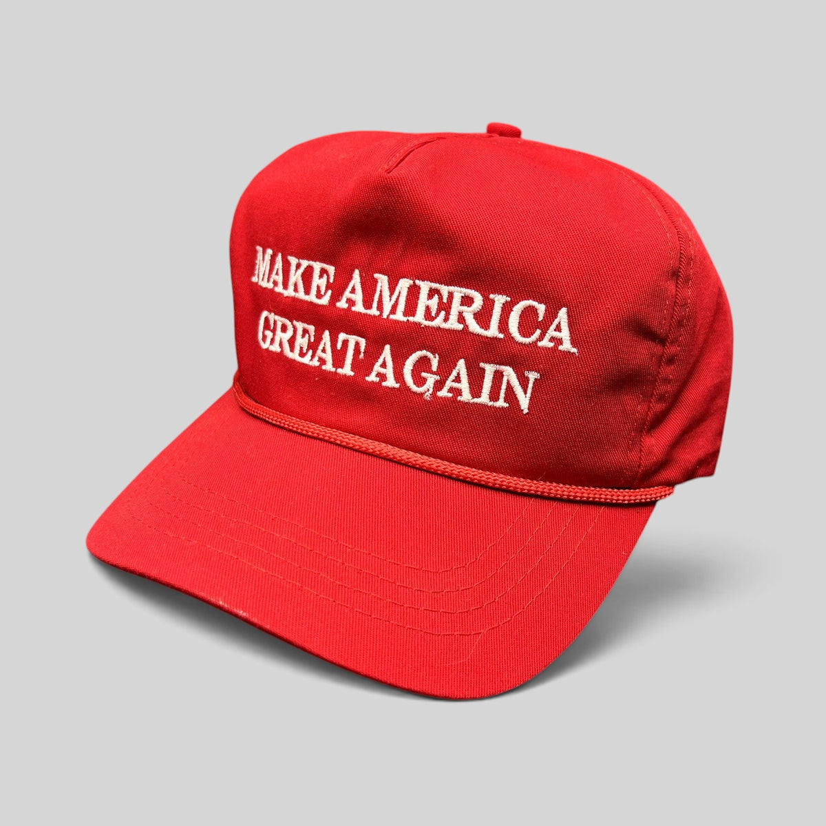 Raree Finds official red MAGA snapback hat with white embroidered lettering and braided rope detail