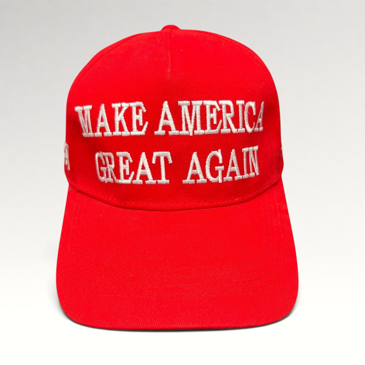 Raree Finds red Make America Great Again strapback baseball cap with bold white embroidered text on a structured crown