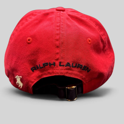 Raree Finds red Polo Sport Ralph Lauren cotton strapback cap featuring rear embroidered pony logo and arch lettering.