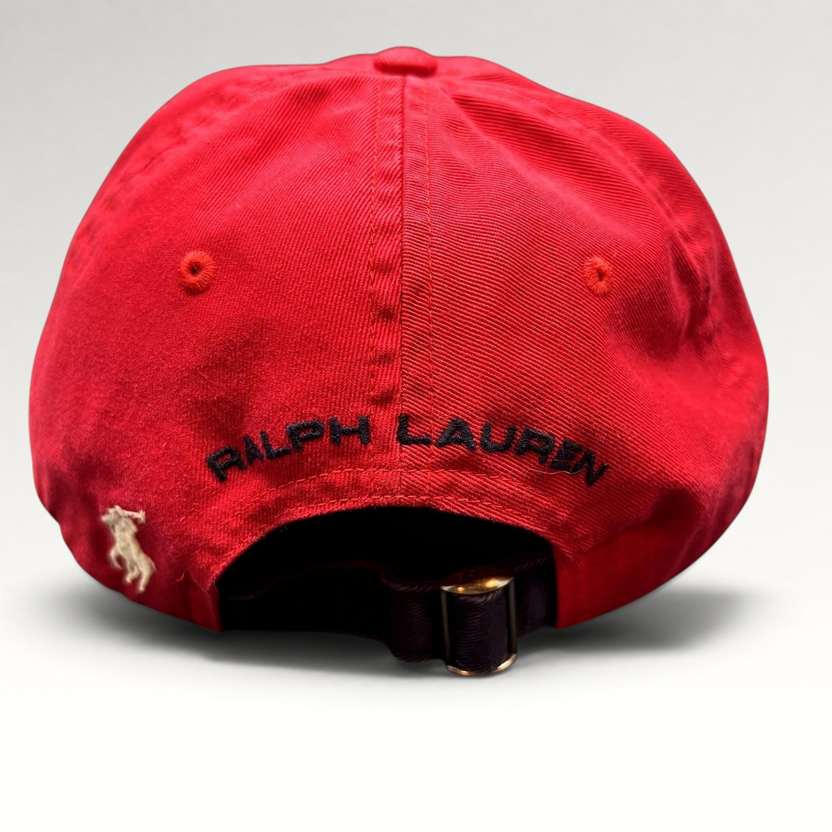 Raree Finds red Polo Sport Ralph Lauren cotton strapback cap featuring rear embroidered pony logo and arch lettering.