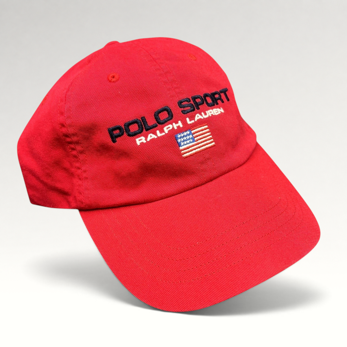 Raree Finds red cotton Polo Sport Ralph Lauren strapback hat with embroidered USA flag and front spellout logo.