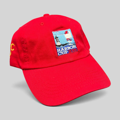Raree Finds red cotton strapback hat featuring a 2019 Harbor Cup lighthouse and sailboat embroidered patch