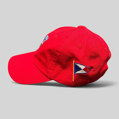 Raree Finds red cotton strapback hat featuring an embroidered sailing burgee on the side and a curved brim.