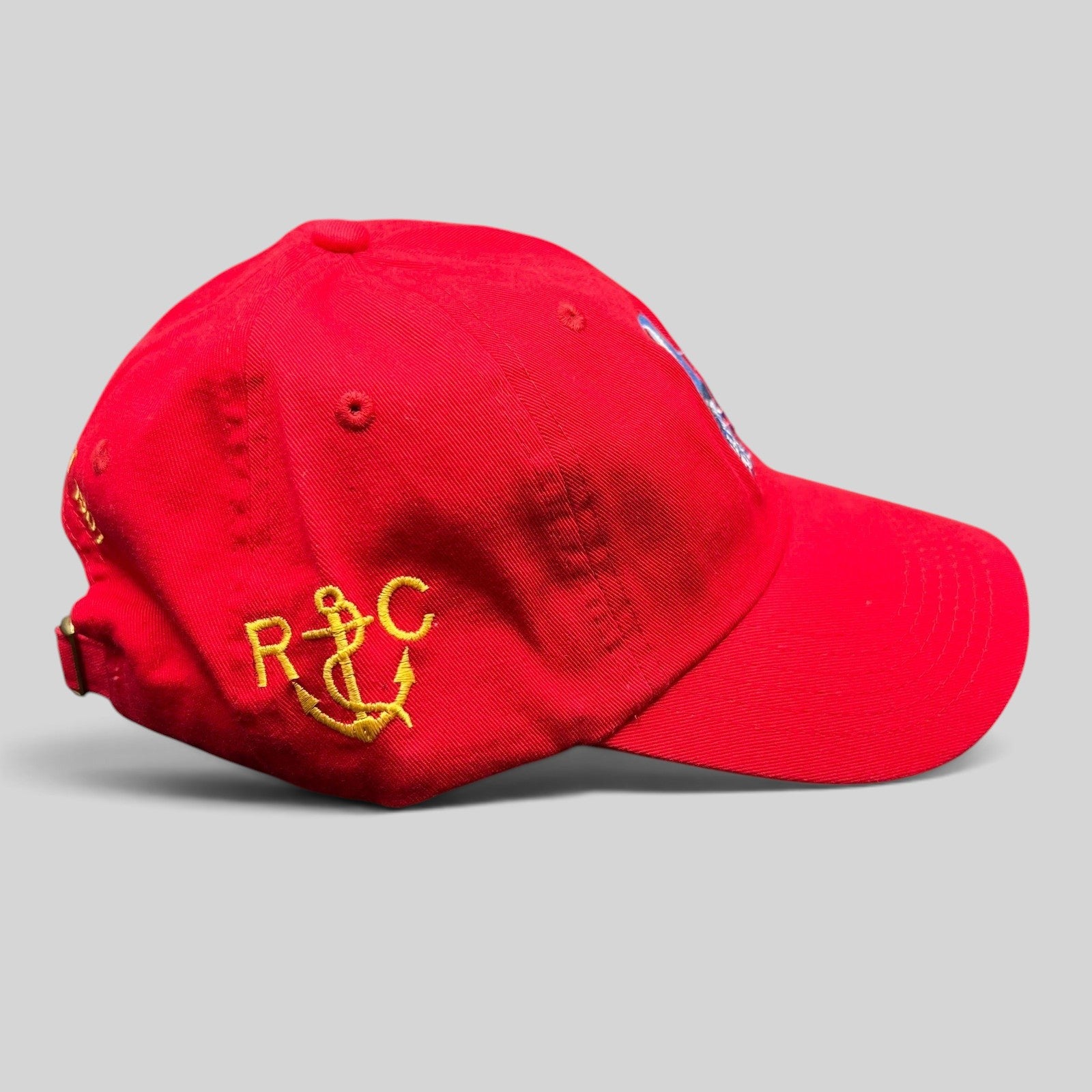 Raree Finds red cotton strapback hat featuring yellow anchor embroidery from the 2019 Los Angeles Yacht Club Harbor Cup