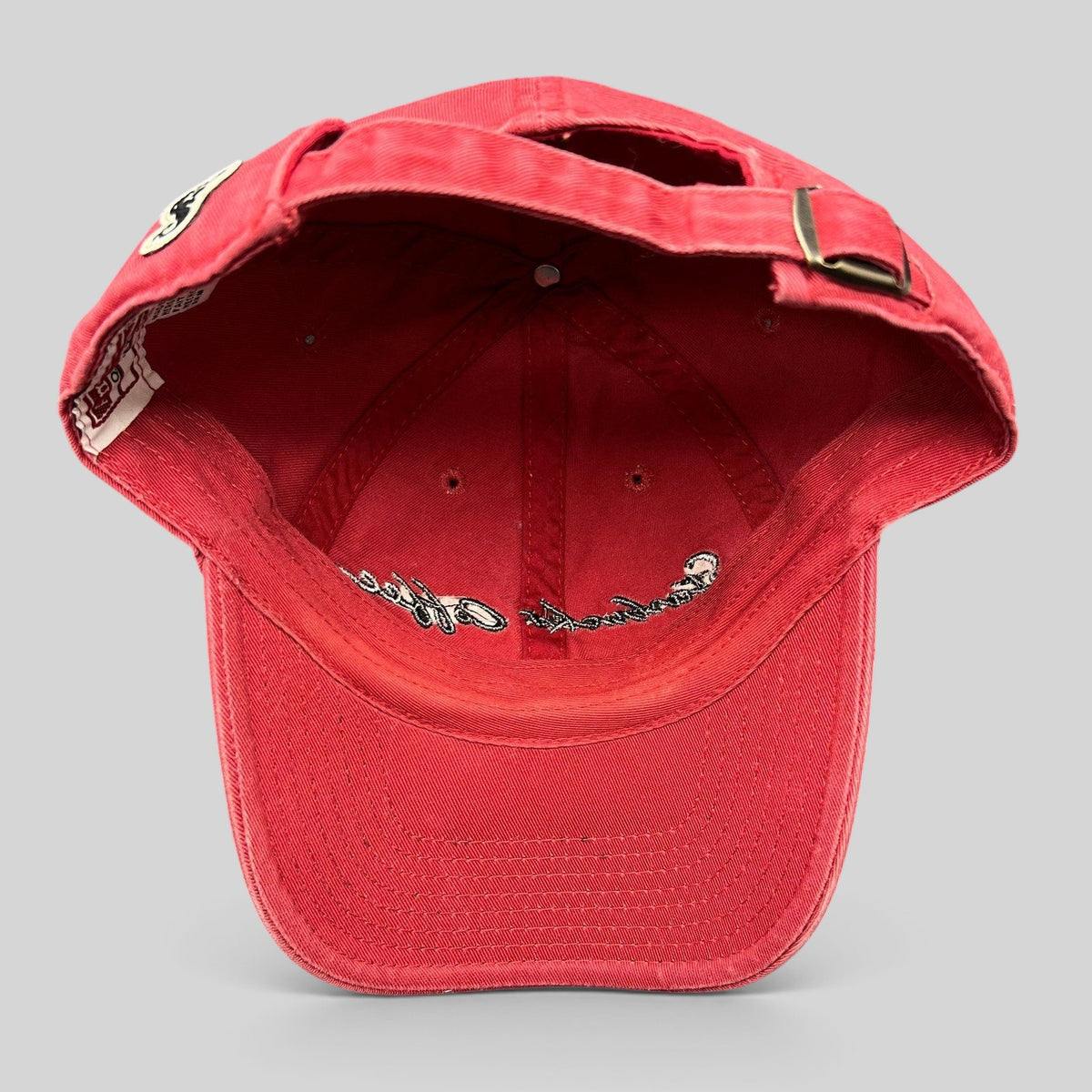 Raree Finds red American Needle Starbucks cotton strapback hat showing interior view with adjustable metal buckle