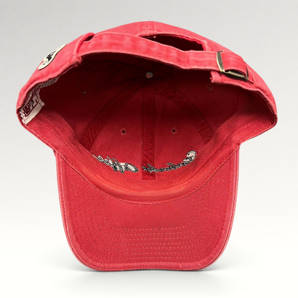 Raree Finds red American Needle Starbucks cotton strapback hat showing interior view with adjustable metal buckle