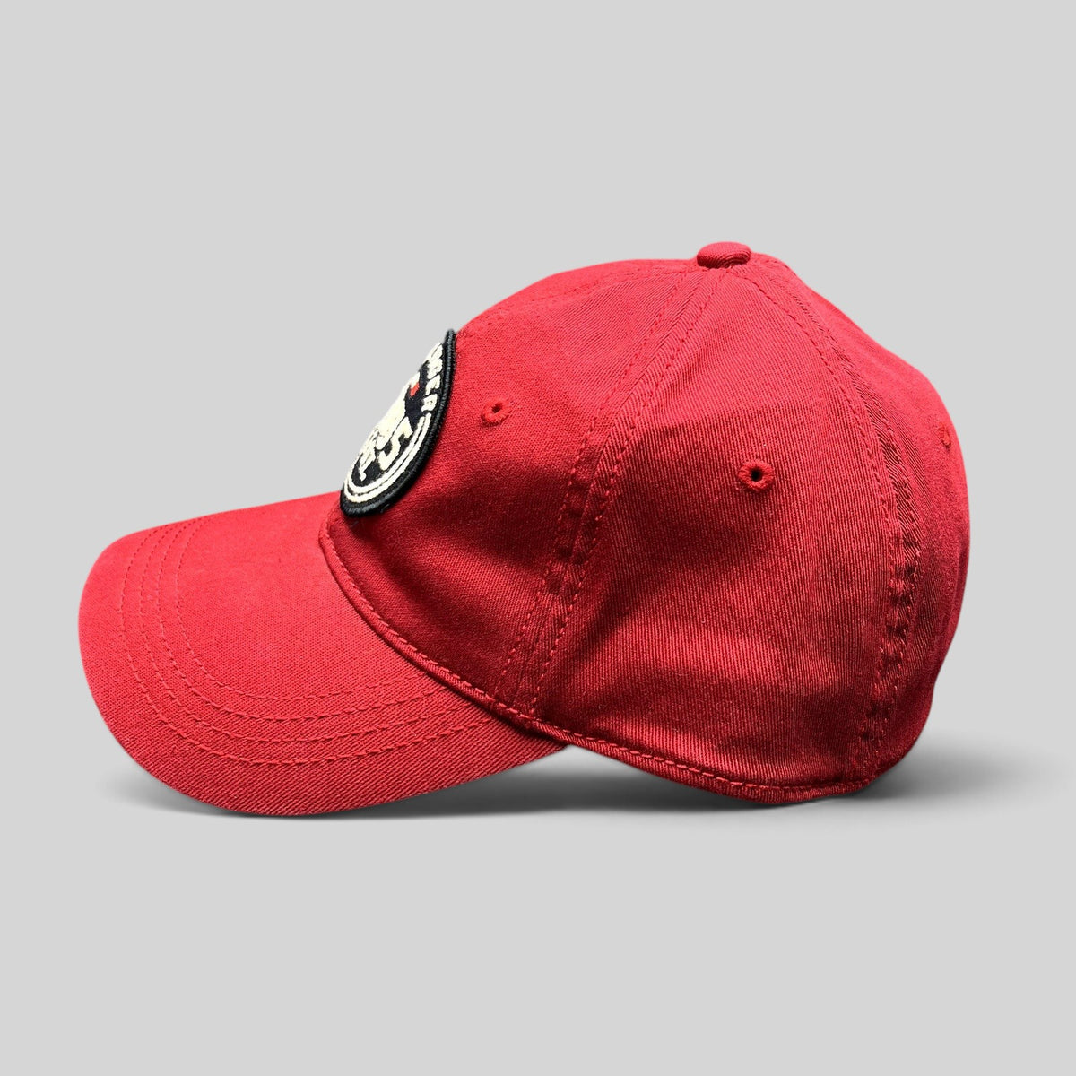 Raree Finds red Tommy Hilfiger 1985 EST fitted hat with a curved brim and embroidered circular front patch