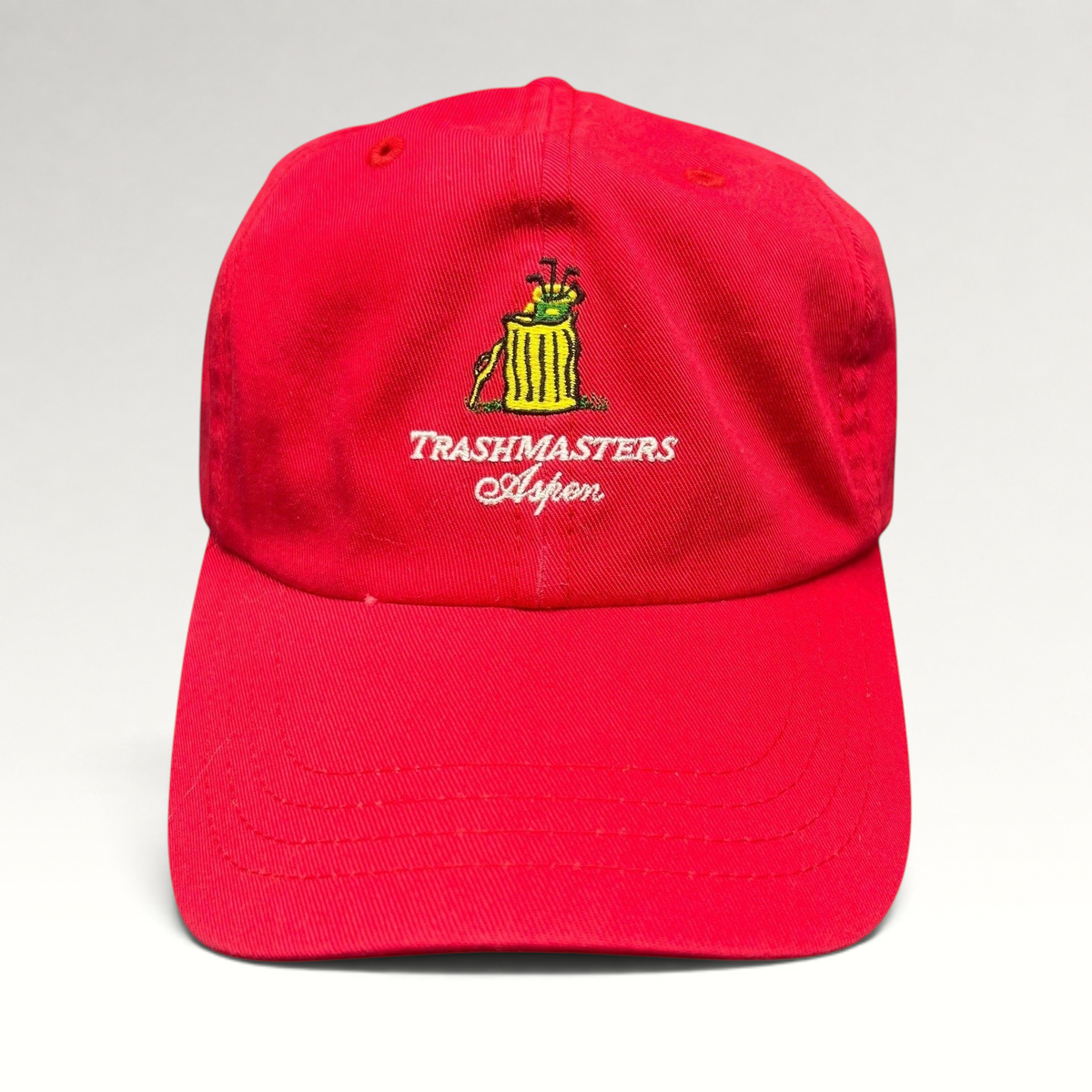 Raree Finds vintage red cotton strapback dad cap with embroidered Trashmasters Aspen trash can golf mascot graphic.