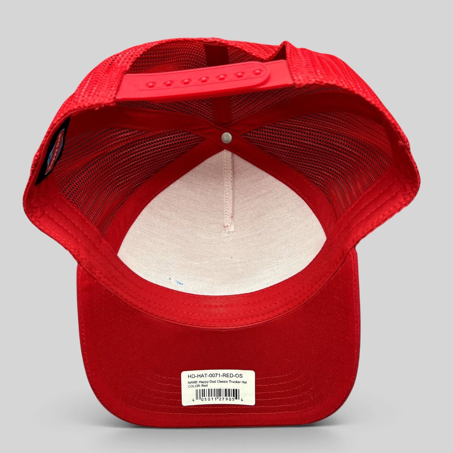 Raree Finds Happy Dad Hard Seltzer red trucker snapback hat showing the interior mesh lining and adjustable strap