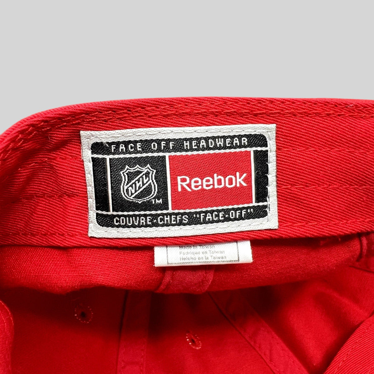 Raree Finds Chicago Blackhawks Reebok Face Off Headwear interior label on a red cotton hat