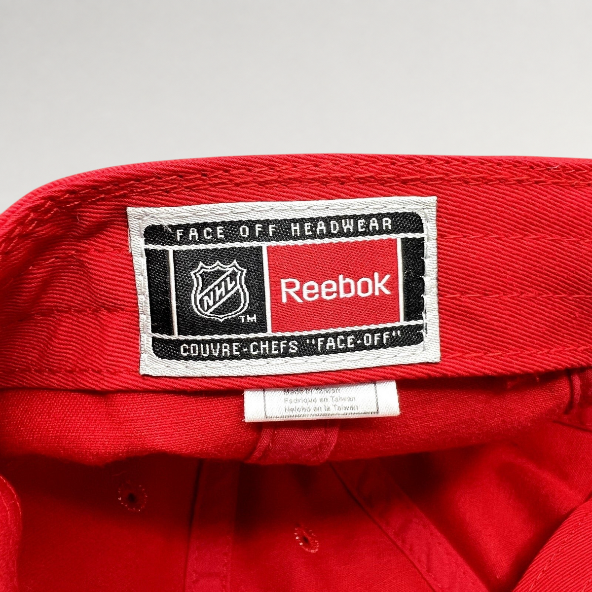 Raree Finds Chicago Blackhawks Reebok Face Off Headwear interior label on a red cotton hat