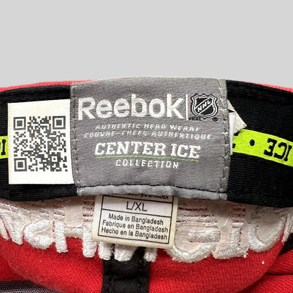 Raree Finds Reebok Center Ice Washington Capitals hat interior label showing size L/XL and official NHL branding