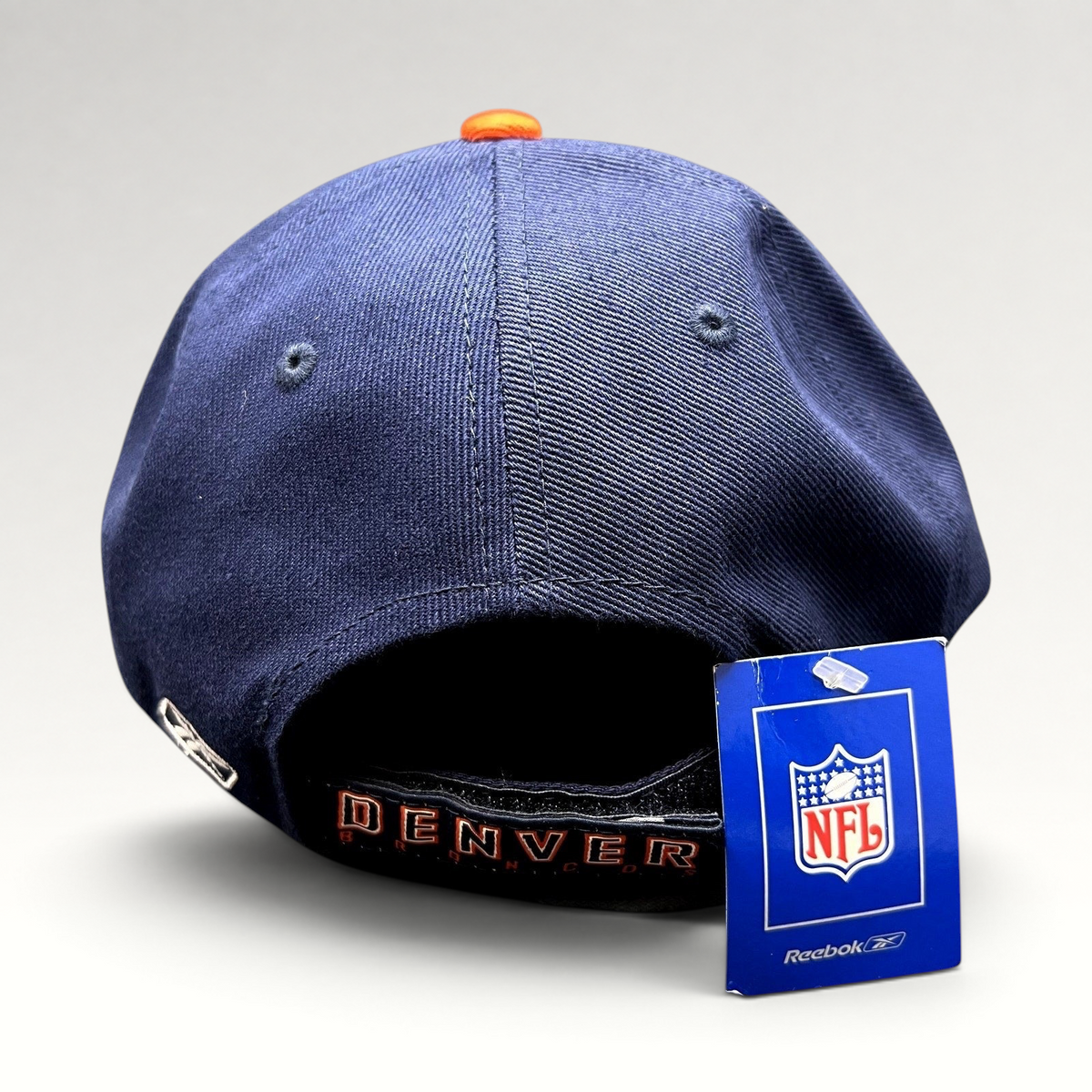 Raree Finds NWT Reebok Denver Broncos navy and orange cotton strapback hat with NFL tag and Denver back embroidery