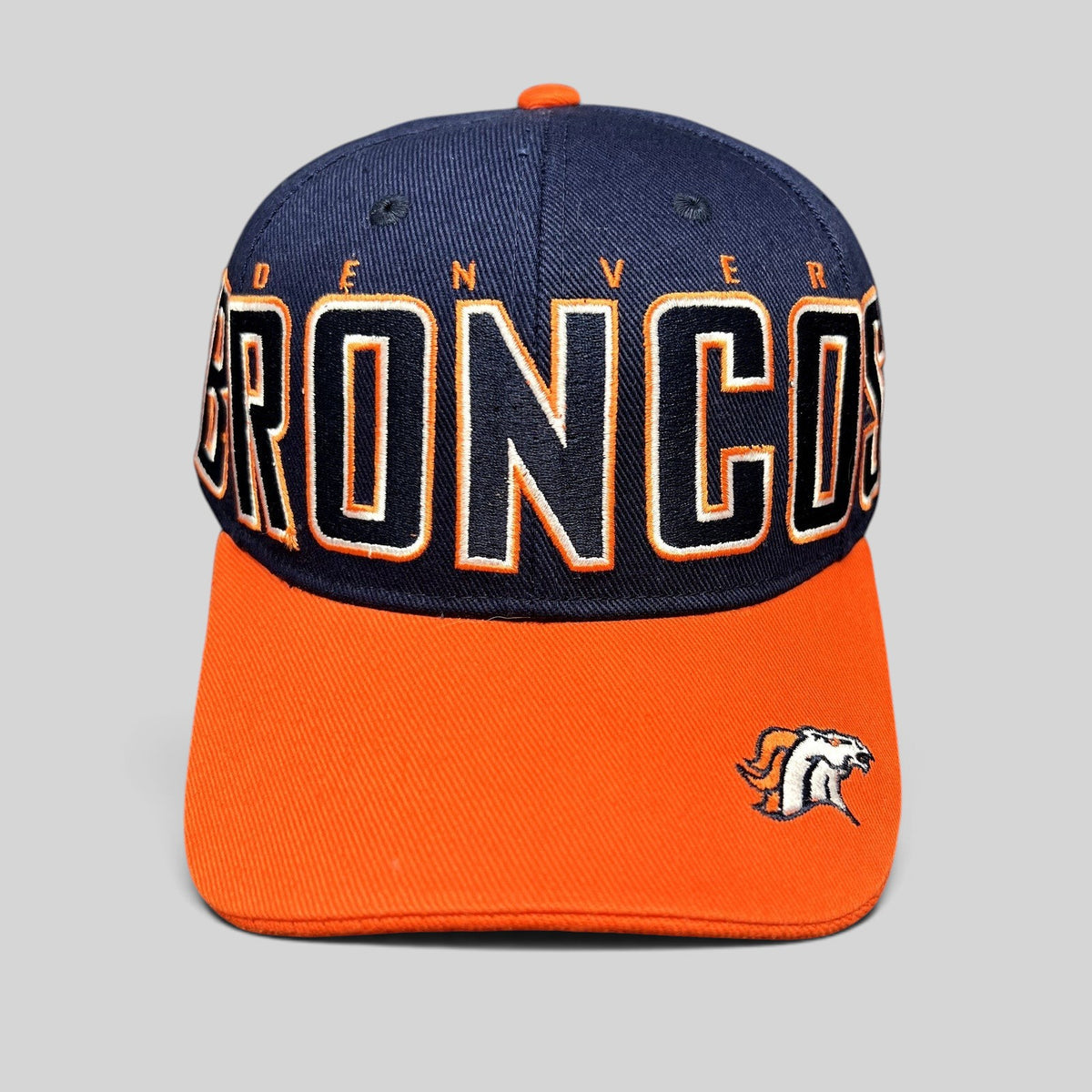 Raree Finds Reebok Denver Broncos NFL strapback hat in navy and orange cotton twill with oversized front embroidery.