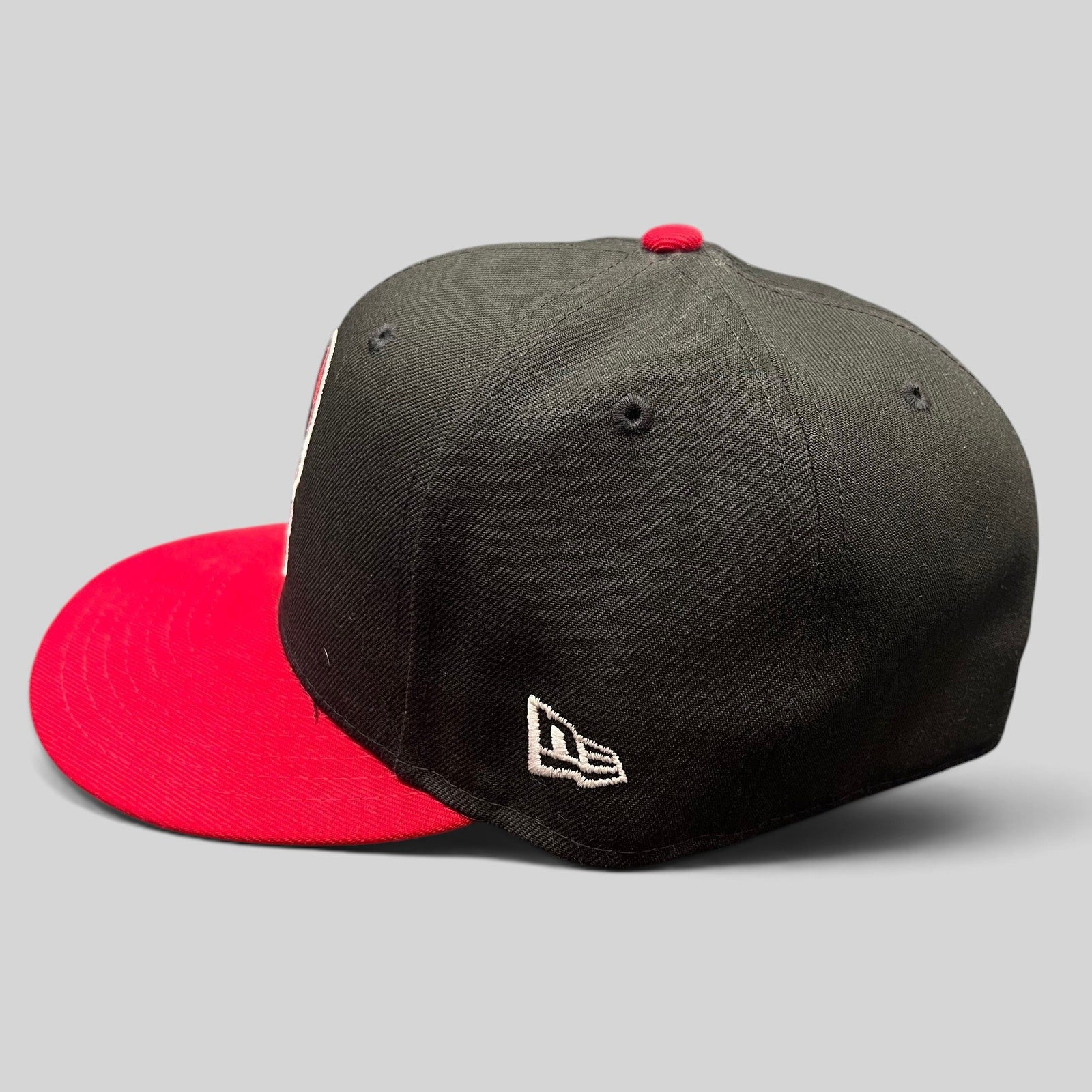 Raree Finds New Era 59FIFTY Richmond Flying Squirrels Marvel Defenders fitted cap with black crown and red flat brim.