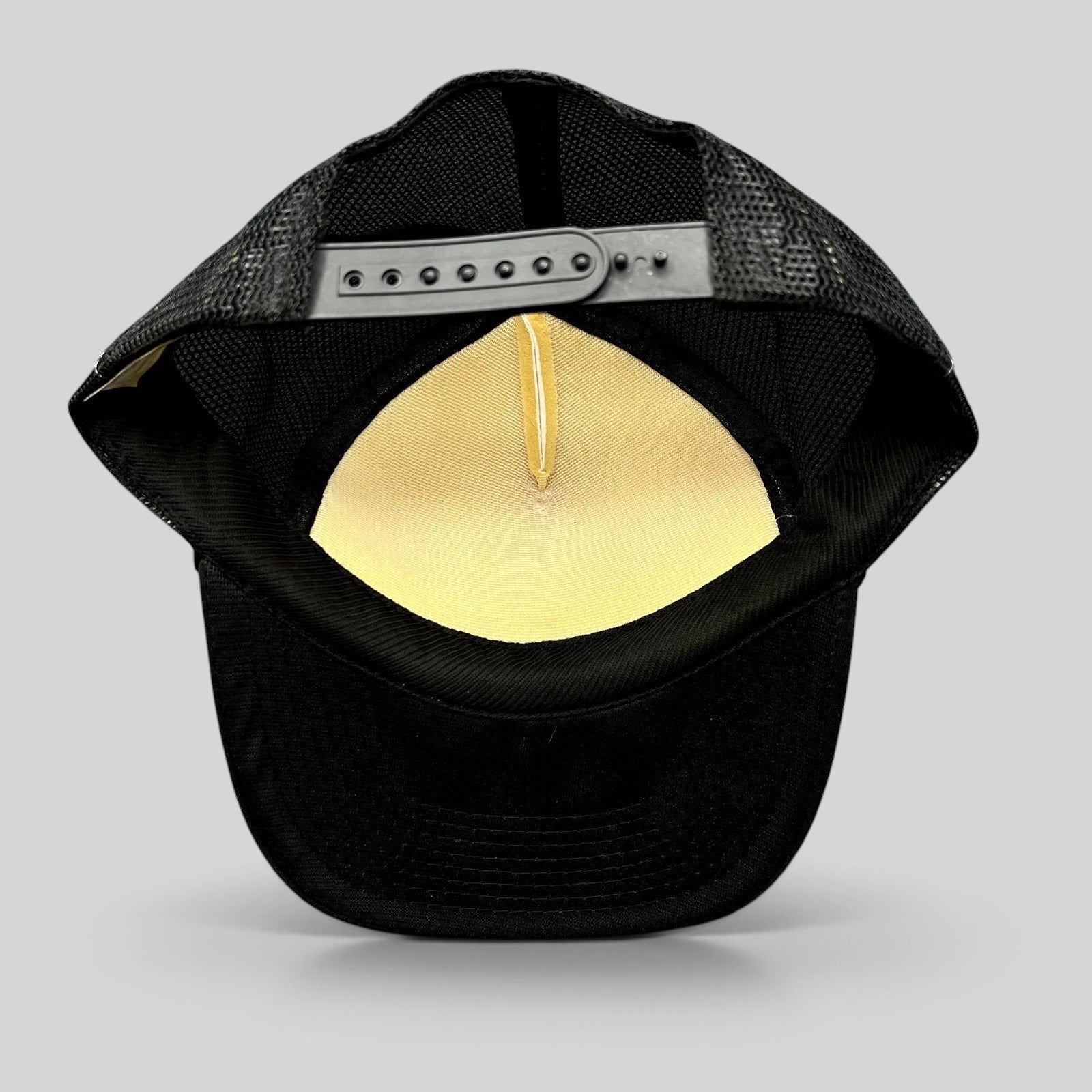 Raree Finds vintage Rockstar Energy Drink trucker hat interior view showing black mesh and adjustable snapback strap