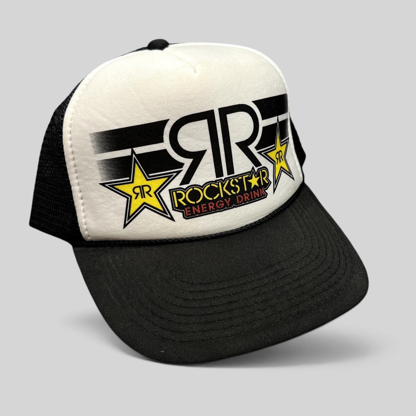 Raree Finds vintage Y2K Rockstar Energy Drink trucker hat with black and white foam front and breathable mesh back.