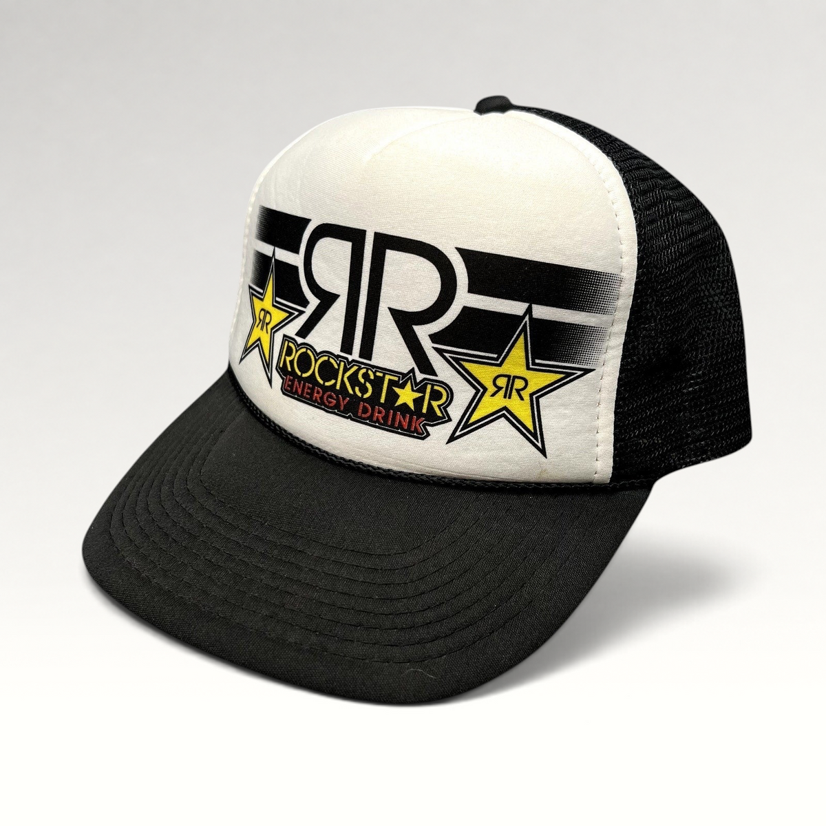 Raree Finds vintage Y2K Rockstar Energy Drink trucker hat with black and white foam front and breathable mesh back.