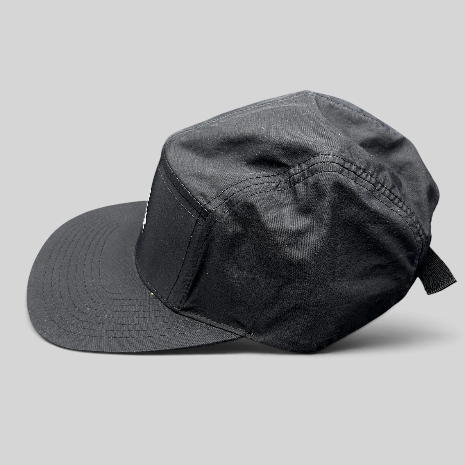 Raree Finds Rockstar Games black nylon 5-panel camp hat with white logo and adjustable strapback closure